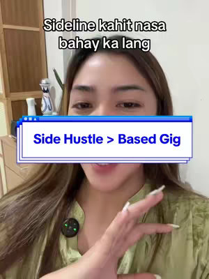 A woman is centered in the frame, smiling and looking directly at viewer. Above her head, text overlays: "Sideline kahait nasa bahay ka lang". Overlayed in front of her face is a blue box with white text: "Side Hustle > Based Gig". She is wearing a light green top, and has long brown hair. The background is slightly out of focus, but shows what appears to be a room in a house.