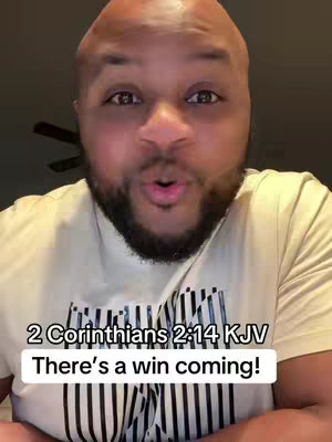 The cover image features a bald Black man with a beard and a light yellow shirt. The man is looking directly at the camera with his mouth open, as if speaking emphatically. Overlay text at the base of the image reads, "2 Corinthians 2:14 KJV There's a win coming!" setting a motivational and potentially religious theme. The lighting appears to be natural and focused on the man's face and upper body.