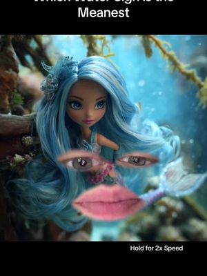 The image shows a doll in a sea-like environment. The doll appears to be a mermaid doll or a doll with a mermaid motif, with long blue hair and a tail. Superimposed on the doll are human eyes and lips to create a human-like composition. Text overlays: 'Which Water Sign is the Meanest' and 'Hold for 2x Speed'. Background features aquatic elements.