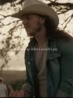 A man in a cowboy hat and jean jacket stands outdoors with text overlayed.
