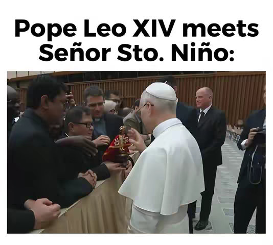 An image capturing a moment between Pope Leo XIV and a Filipino priest holding an image of the Santo Niño de Cebu, with a crowd of people in the background.