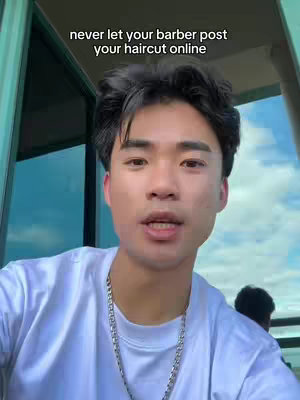 The cover image features a young Asian man in a white shirt, looking directly at the viewer and talking. Above his head is white text that reads 'never let your barber post your haircut online'. In the background, a window with a view of the sky and a glimpse of another person adds context.