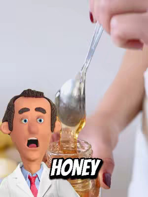The image shows a claymation doctor with wide eyes and an open mouth, looking surprised, in front of a jar of honey being poured onto a spoon by a hand with red nail polish. The word "HONEY" is displayed beneath the jar. The background is a plain, light color.
