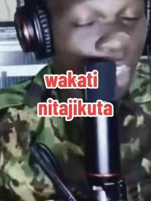 The cover image features a person singing into a microphone. The person wears a camouflage-patterned shirt and black headphones. Overlayed in the center are the words 'wakati nitajikuta' in a bold, white font with a red outline. The background appears to be a dimly lit space.