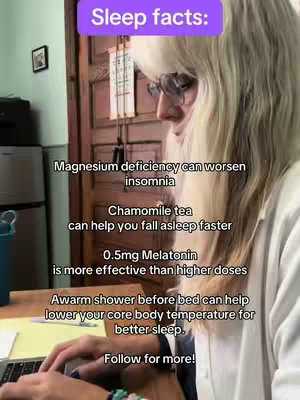 A person with long blonde hair wearing glasses is sitting at a desk in front of a laptop, with a door and other items in the background. A text overlay in a purple box at the top reads 'Sleep facts:'. Below this, text describes the effects of magnesium deficiency, chamomile tea, and melatonin. The creator is also holding the laptop, with a keyboard visible in front of them.