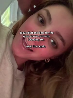 A selfie-style image featuring a young woman in a close-up shot. She has light skin, long blonde hair, and is wearing a light-colored top. The background is blurred, suggesting an indoor setting with a glimpse of a window. Text overlays are present, with messages that address the viewer directly.