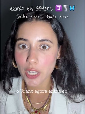 A selfie-style video cover with a young woman looking directly at the camera with a slightly open mouth. The background is a blurred neutral color. The overlay includes text at the top and bottom, along with astrological symbols.
