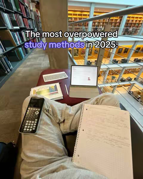 The cover image shows someone sitting in a library, with a laptop, calculator, notebook, and color chart on a desk in front of them. The person is wearing light-colored pants and the composition includes the person, the study materials, a blurred background of the library, and an added text overlay.