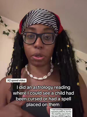 A woman with long black hair, wearing glasses and a bandana, is shown from the chest up. Text overlays include information about an astrology reading.