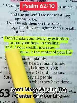 An image of a page from a Bible with text and highlighted portions. The text in a red rectangle at the top of the image says 'Psalm 62:10'. In the bottom half of the image, another text is added 'Don't Make Wealth The Center Of Your Life'. The whole image has a high key lighting.