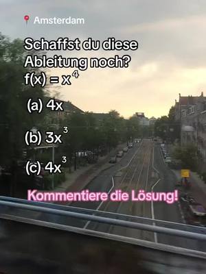 The cover image displays a street scene in Amsterdam during dusk or dawn with buildings lining both sides of the road. The sky has a gradient of colors, transitioning from a cloudy gray to orange. The road has tram tracks running down the center. Text overlays are placed towards the top and bottom to pose a math question.