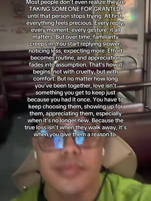 A selfie-style video with the creator centered in the image. The background is slightly blurred, suggesting an indoor setting. The creator is wearing glasses and has text overlaid at the top, in a sans-serif font.