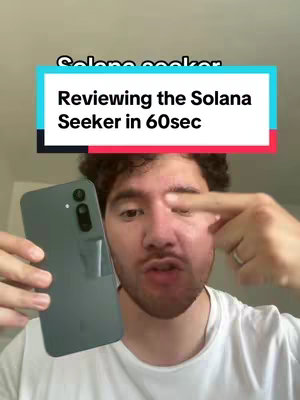 The cover image shows a man holding a gray smartphone with a clear case on the bottom left of the screen. The man is looking at and pointing towards the phone. A colorful banner with the text 'Reviewing the Solana Seeker in 60sec' is placed on top of the man's head, and 'Solana seeker' text is seen at the top of the image.