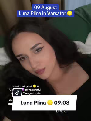 A young woman with dark hair is shown in a selfie-style shot from the chest up. She is in a relaxed pose on a light-colored surface. Text overlays with astrological keywords and dates are at the top and bottom, along with a few overlay banners.