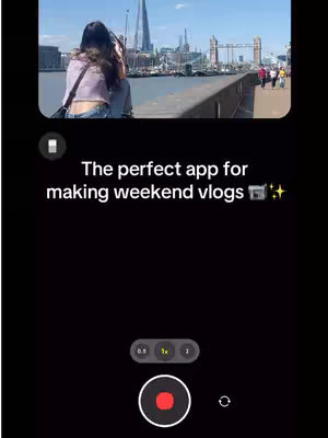The cover image shows a phone screen with an app interface. The main visual is a video of a person with their back turned, holding the phone and filming the cityscape of London, England with the Tower Bridge and the Shard in the background. Text overlayed on the screen says: "The perfect app for making weekend vlogs" with sparkles.