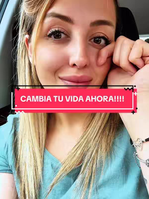 A woman with long blonde hair and a light blue top is shown in a selfie-style shot. She has her right hand on her cheek and is smiling slightly. A red banner with white text is overlaid on the image.