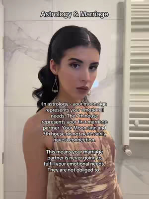 A young woman with dark hair and a top is centered in the frame, posing for the camera. Behind her, a light gray tiled wall is visible. Text overlays provide information about astrology and marriage.