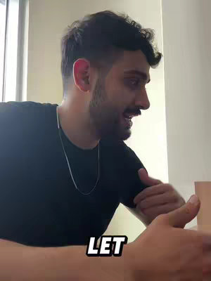 A man with short, dark hair and a beard is looking to the right, with the word "LET" overlaid on the bottom of the image.
