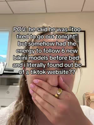 A selfie-style video cover image of a person with a hand covering their mouth, indicating surprise, and text overlayed with a relationship-related theme.