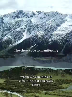 An image of a mountainous landscape and a body of water. The top part of the image features a mountainous landscape covered in snow. Below the snow-capped mountains, there is a deep body of water, likely a lake. At the bottom of the image is what appears to be a grassy hillside. Text overlays reading "The cheat code to manifesting" and "whenever you think of something that you really desire" are positioned on the image.