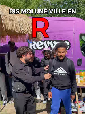 A group of people, standing outdoors in a sunny setting, are gathered near a purple van. The text overlay in the image presents a question regarding cities and the letter 'R'.