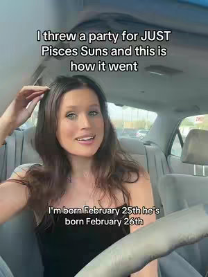 A woman with long brown hair and light eyes is sitting in the front seat of a car. The background is blurred with the backseats of the car and an outdoor scene visible through the windows. Text overlays are positioned above and below the woman. The woman smiles slightly.