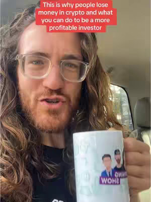A selfie-style shot with a man holding a mug in a car. The man, with long curly brown hair and glasses, is speaking to the camera, and a red bar with text appears above his head. The mug has images and text on the side. The background has car seats and a window.