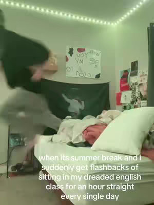 The image shows a dimly lit room with a bed on the right side and a person jumping in the background. The bed has a white pillow and a blanket. The caption is overlaid on the image.