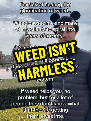 The cover image shows a man wearing a black beanie with Mickey Mouse ears, standing in front of a blurred background of a building that looks like a castle. The man is wearing a black vest over a black shirt. Overlayed on the man is a yellow rectangle with the text 'WEED ISN'T HARMLESS' in bold, black font. Several lines of white text are above and below the rectangular overlay, discussing the topic of weed's potential negative effects