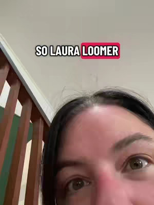 The image shows a close-up of a woman's face, focusing on her eyes and forehead. Above her head, the text reads "SO LAURA LOOMER" in a bold, sans-serif font with a red rectangular background. The woman's expression suggests a mixture of curiosity and slight surprise, the color palette is neutral-toned with hints of the interior.