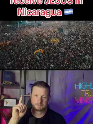 The image is a split screen. The top half shows a large crowd of people in what appears to be an outdoor gathering, likely at night. The bottom half is in a dimly lit room, with a man in a black shirt and a finger raised, presumably the speaker. He has a neutral expression. At the top of the screen is text in a red box, against a black background.