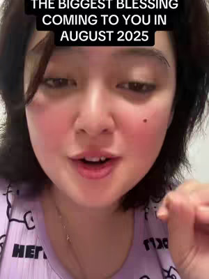 A woman with fair skin and short dark hair is centered in the cover image, looking at the camera and speaking. The top portion of the image contains text overlaid on a black background. She wears a purple shirt with a pattern on it. The background is neutral.