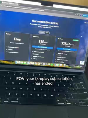 A laptop displaying a website about subscription plans, with a keyboard visible in the foreground. Text overlays the image with the creator's point of view.