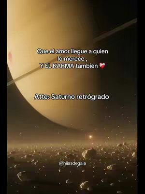 The cover image depicts a celestial scene featuring Saturn in the upper portion with its distinctive rings. Below, a grainy composition resembles an asteroid field under an orange-tinged ambiance, with text overlayed on the upper portion. The text states: 'Que el amor llegue a quien lo merece, Y EL KARMA también'. Further down, there is 'Atte: Saturno retrógrado', and the Instagram handle. @hijasdegaia is shown at the bottom indicating the content's source.