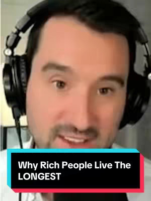 A man wearing headphones is shown from the chest up in a well-lit environment. A title overlay with a black background and white text that reads, "Why Rich People Live The LONGEST" is placed at the bottom of the frame.