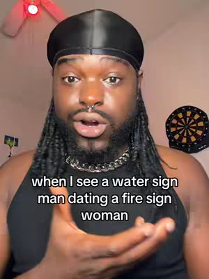 The cover image shows a Black man with a beard and dreadlocks, wearing a black durag and a chain necklace. The background suggests a bedroom setting. Text overlays at the bottom read, 'when I see a water sign man dating a fire sign woman.'