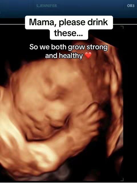 The cover image is a close-up brown-toned ultrasound scan of an unborn baby. The baby's face is visible, mostly in profile, with the profile of its cheek, nose, and eye. A text overlay states, 'Mama, please drink these...', emphasizing the importance of hydration during pregnancy in support of the baby's development. The image has a warm, intimate feel of care.