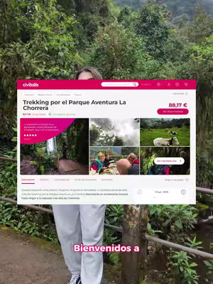 A woman is standing in front of a background of lush green foliage, partially concealing her face with a tablet-like screen displaying a website. The website, which may be for a tour booking service, displays information about a trekking adventure: "Trekking por el Parque Aventura La Chorrera". Below, text reads "Bienvenidos a". The woman is wearing light-colored pants and sneakers. The overall composition is vertical, and it appears to be a promotional shot for an outdoor experience. The environment seems lush and natural, creating an inviting image.