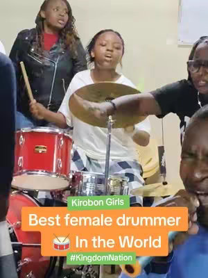 A cover image shows four dark-skinned females, one seated behind a drum set, playing a cymbal. The text overlay states "Best female drummer In the World #KingdomNation" in a colored rectangle.