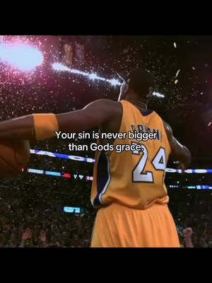 The image shows basketball player Kobe Bryant, wearing his jersey with the number 24 on the back, celebrating after what appears to be a game victory. He is holding a basketball and confetti is falling all around him. Text overlay at the bottom says "Your sin is never bigger than Gods grace."
