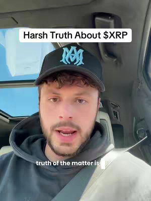 A man wearing a black cap and a black hoodie is speaking into the camera from inside a car. Text overlays the image, indicating the topic of the video.