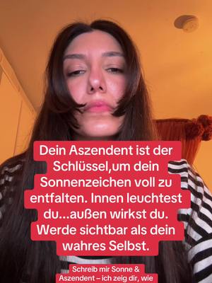 A woman with long brown hair framed by a fringe is centered in the frame, looking slightly down. She's wearing a black and white striped shirt. A red rectangle with white text overlies the image, containing the video's hook. The background shows an orange-toned setting.