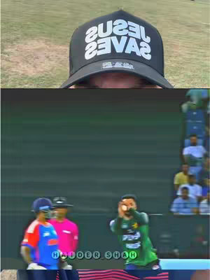The cover image is a split view. The top shows the upper portion of a person wearing a black baseball cap with the words 'JESUS SAVES' in white lettering. The bottom features a slightly blurry, action shot from a cricket match, with players in green and blue uniforms on the field.