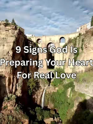 The image shows a picturesque landscape featuring a large stone bridge with multiple arches spanning a gorge. A waterfall cascades down the side of the cliff, and lush green vegetation grows around it. The sky is blue with scattered clouds, and the text overlay reads, '9 Signs God Is Preparing Your Heart For Real Love.'