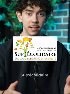 A young man with curly hair and a mustache is centered in the frame, set against a backdrop that includes a brick wall and greenery. He is wearing a black sweater, and a logo for Sup'écolidaire, an ecological higher education school, is superimposed on his chest. The logo is a tree with hands and text, with the school's name on top.