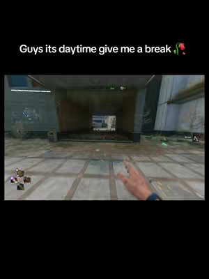 The image shows a first-person view in a video game. The game environment features a concrete and industrial design with neutral colors. The hand of the gamer is visible in the foreground. Text overlayed on the image reads: 'Guys its daytime give me a break'.
