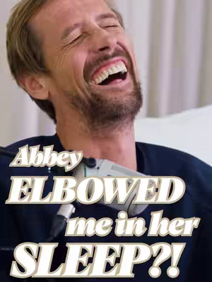 The cover photo features a man with blond hair and a beard mid-laughter, with his eyes closed. The text overlay reads, 'Abbey ELBOWED me in her SLEEP?!'