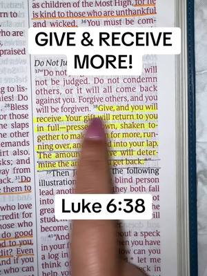 An open Bible with emphasized text, 'Give, and you will receive' and the reference Luke 6:38 in a white rectangle. A finger with pink nail polish points to the highlighted verse.