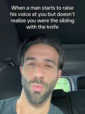 A man with a beard is shown in a car, partially visible. Text overlaid on the image reads, "When a man starts to raise his voice at you but doesn't realize you were the sibling with the knife."