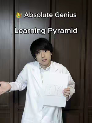 A man in a white lab coat holds a drawing of a learning pyramid, standing in front of a brown wooden door.